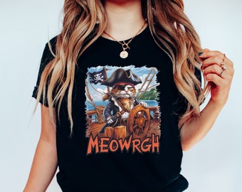 May include: Black t-shirt with a graphic of a cat dressed as a pirate captain with a pirate flag and the text "MEOWRGH".