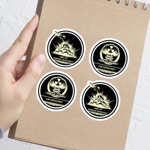 Vier democratie-stickers