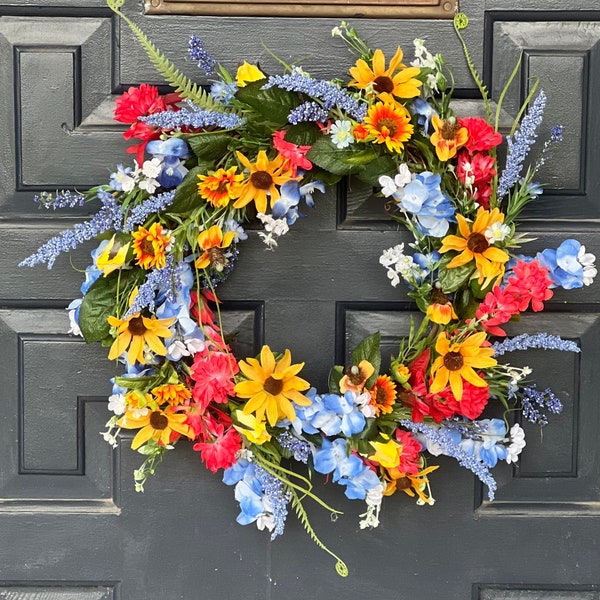 Every day round grapevine wreath of colorful Texas spring wildflowers