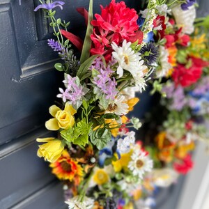 All season round grapevine wreath featuring multiple colors of Texas wildflowers including bluebonnets and Indian paintbrush perfect gift image 4