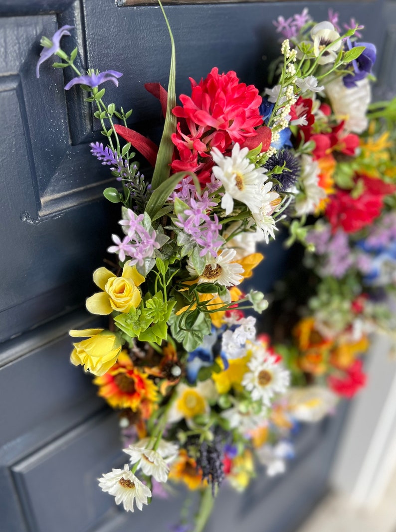 All season round grapevine wreath featuring multiple colors of Texas wildflowers including bluebonnets and Indian paintbrush perfect gift image 4