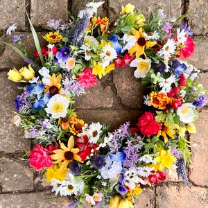 All season round grapevine wreath featuring multiple colors of Texas wildflowers including bluebonnets and Indian paintbrush perfect gift image 1
