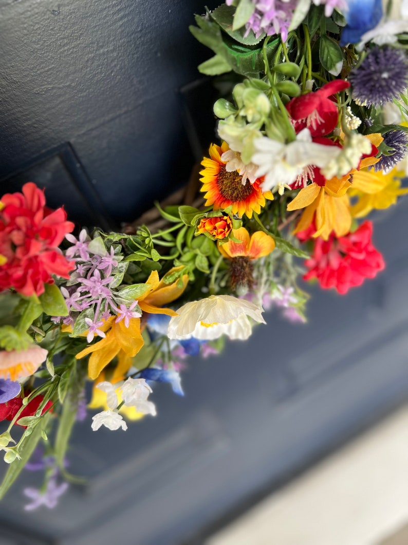 All season round grapevine wreath featuring multiple colors of Texas wildflowers including bluebonnets and Indian paintbrush perfect gift image 7