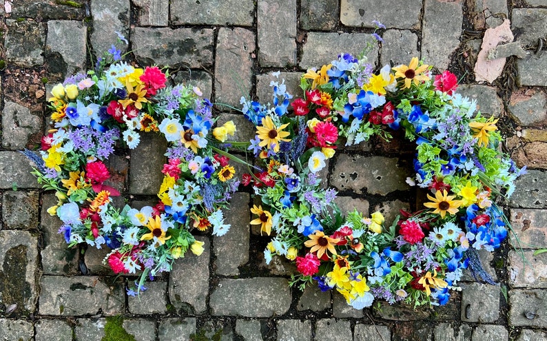 All season round grapevine wreath featuring multiple colors of Texas wildflowers including bluebonnets and Indian paintbrush perfect gift image 9