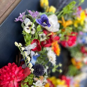 All season round grapevine wreath featuring multiple colors of Texas wildflowers including bluebonnets and Indian paintbrush perfect gift image 5