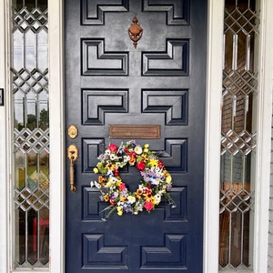 All season round grapevine wreath featuring multiple colors of Texas wildflowers including bluebonnets and Indian paintbrush perfect gift image 3