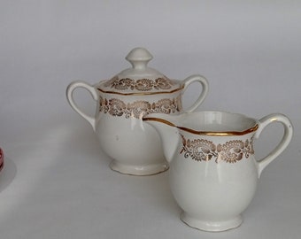 Sugar pot and milk pot set with vintage gilding