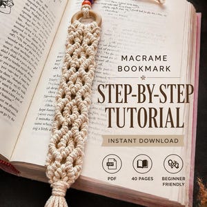May include: A handmade macrame bookmark with a wooden ring and tassel, resting on an open book. The bookmark is beige with a woven design and colorful beads. Text on the book reads "Macrame Bookmark Step-by-Step Tutorial".