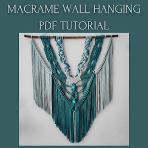 May include: A macrame wall hanging with a PDF tutorial. The wall hanging features a teal, gray, and white design with intricate knotting and fringe. The text "MACRAME WALL HANGING PDF TUTORIAL" is at the top.