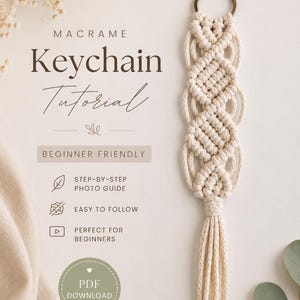 May include: A macrame keychain tutorial with the text "Macrame Keychain Tutorial" and "Beginner Friendly". The keychain is cream-colored, with a metal ring and a tassel. The tutorial includes a step-by-step photo guide and is easy to follow.