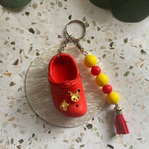 Red anime croc keychain, beach/Bogg bag charm, clip, accessories. Mini rubber clog, shoe keychain
