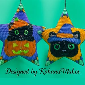 May include: Two beaded star decorations with Halloween designs. One shows a black cat in a pumpkin, the other a black cat in a witch's hat. The stars are purple, orange, yellow, and green. Text reads "Designed by Kohana Makes."