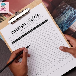 May include: A light-colored wooden clipboard holding a white inventory tracker sheet with black text. The form includes columns for date, item description, location, category, quantity on hand, unit, unit cost, and notes, with a total value box.