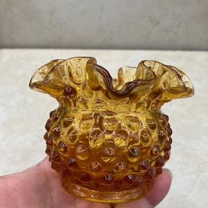 A Beautiful Vintage Fenton Amber Hobnail Glass Footed Vase Ruffled Edge USA
