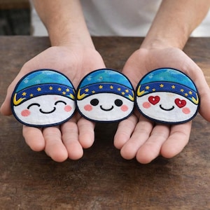 May include: A rustic wooden sign with the text "Welcome to our home" in white lettering. The sign features a distressed finish and a simple, inviting design, perfect for front door decor.