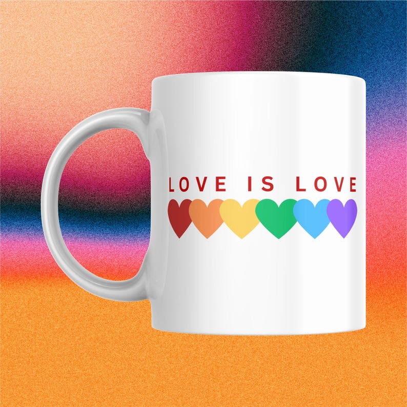 May include: White ceramic mug with the text "LOVE IS LOVE" in red letters. Below the text are six colorful hearts in a rainbow pattern. The mug has a curved handle and is set against a colorful gradient background.
