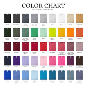 May include: Color chart showing 48 different colors of Gildan 18000 sweatshirts. The colors are arranged in rows and columns, with each color represented by a small square.