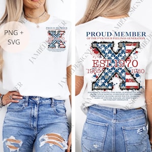 May include: White t-shirt featuring a large "X" design with a patriotic stars and stripes pattern. The front of the shirt reads "PROUD MEMBER EST. 1970". The back of the shirt reads "PROUD MEMBER OF THE F*CK YOUR FEELINGS GENERATION EST. 1970".