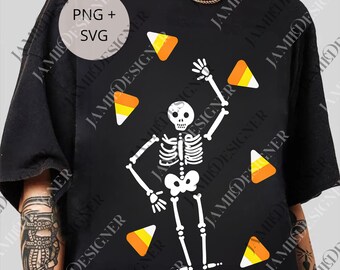 May include: Black t-shirt featuring a white skeleton juggling candy corn. The design includes the text "PNG + SVG" in a circle. A gold chain is visible at the top. The design is perfect for Halloween.
