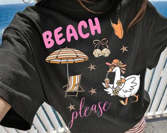 May include: A black t-shirt featuring the pink text BEACH please, a striped beach umbrella, a beach chair, a swimsuit, seashells, starfish, and a white goose wearing a sun hat and sunglasses while holding a drink with a straw.