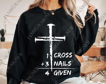 May include: Black sweatshirt featuring a white cross design with the text "1 Cross + 3 Nails = 4 Given". The graphic is centered on the front of the long-sleeved top. The sweatshirt is a casual style.