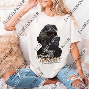 a woman wearing a white tshirt with a black gorilla on it