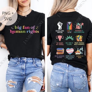 May include: Black t-shirt with the text "big fan of human rights" in colorful letters. The back of the shirt features various graphics and phrases, including "Black Lives Matter" and "Love is Love."
