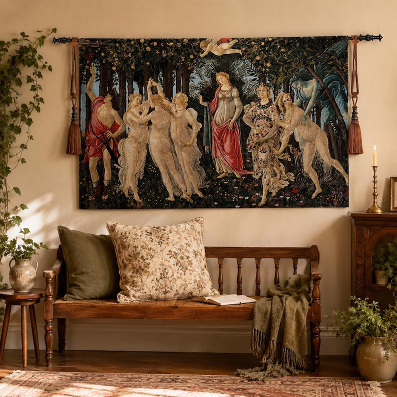 May include: A rectangular wall tapestry featuring a reproduction of Botticelli's Primavera painting, depicting mythological figures in a dark forest setting. The tapestry is suspended from a black metal rod with brown decorative tassels on each side.