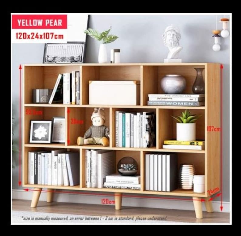 #WoodenShelf #OpenBookcase #3TierDisplay #FreestandingCabinet #RackwithLegs #MultipleCubes #FreeStandingBookshelf #HousewarmingGift #HomeDecor #ModernFurniture #StorageSolution #OrganizedLiving #InteriorDesign #MinimalistStyle #NaturalWood