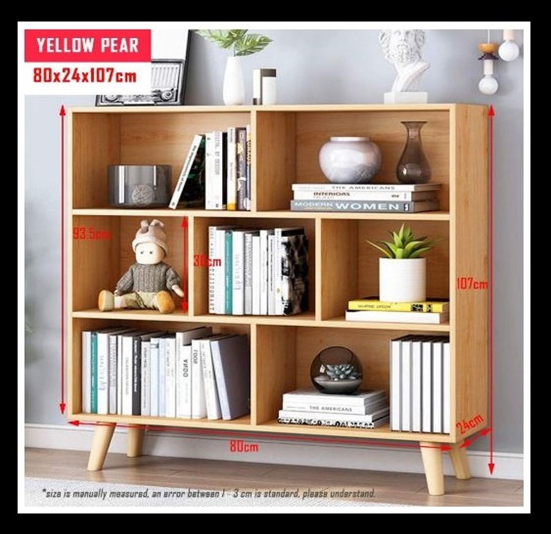 #WoodenShelf #OpenBookcase #3TierDisplay #FreestandingCabinet #RackwithLegs #MultipleCubes #FreeStandingBookshelf #HousewarmingGift #HomeDecor #ModernFurniture #StorageSolution #OrganizedLiving #InteriorDesign #MinimalistStyle #NaturalWood