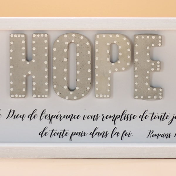 Christian table decorated with letters in concrete. "HOPE"