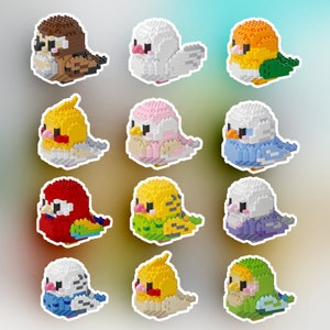 May include: Twelve colorful miniature bird figurines made of plastic building blocks. Each bird is a different color and has a unique design. The birds are arranged in three rows of four.