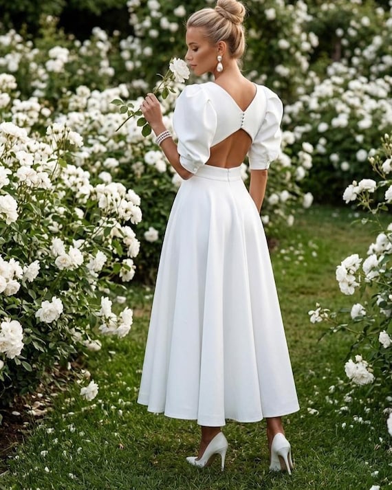 midi white bridal dress Cressida The back is decorated with functional satin buttons Modern Short Summer Wedding Dress