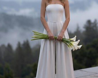 Bridal jumpsuit with elegant corset bodice and wide leg trousers for modern civil wedding