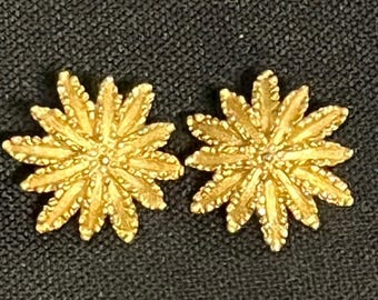 Pendientes de clip vintage dorados con forma de estrella de los años 60 de Avon