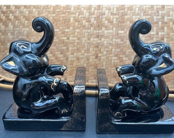 Vintage Redware olifant boekensteunen zwart-gouden keramische beeldjes Good Luck