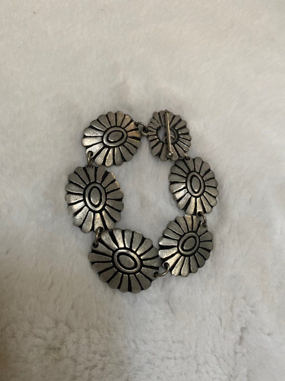 Alice Seely . Pewter toggle concho or flower link 