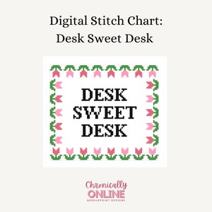 May include: A digital cross stitch chart featuring a white background with a black border and the text "DESK SWEET DESK" in black letters. The border is decorated with pink and green tulips.