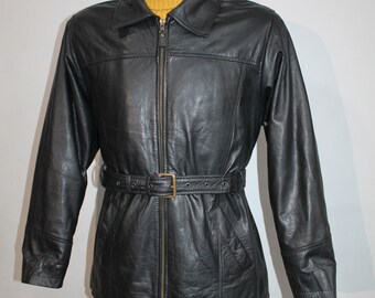 May include: A black leather jacket with a zipper closure and a belt. The jacket has a stand-up collar and long sleeves.