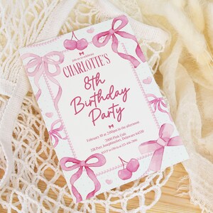 May include: Pink and white birthday party invitation with a watercolor design of bows and cherries. The invitation says "Join us to celebrate CHARLOTTE'S 8th Birthday Party" and includes the date, time, location, and RSVP information.