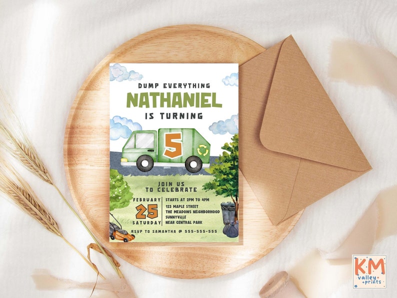 May include: A birthday party invitation featuring a green garbage truck illustration with the number 5. The invitation includes the text "Dump Everything, Nathaniel is Turning" and event details. The invitation is on a wooden tray with a brown envelope.