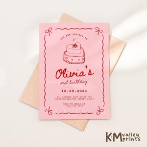 May include: Pink invitation card with red text and a hand-drawn illustration of a heart-shaped cake. The text reads "You are invited to Olivia's 21st birthday 12.20.2024 904 Steuber Flat Suite 089 Yoshikoville, New Jersey 12345 RSVP to Emily at +123-456-7890".