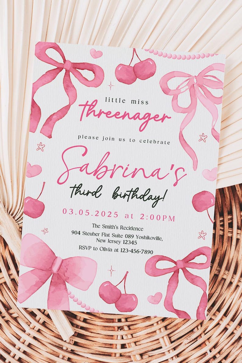May include: Pink birthday invitation with a watercolor design of cherries, bows, and hearts. The text reads "little miss Threenager" and "Sabrina's third birthday!" with the date and time of the party. The invitation also includes the address and RSVP information.