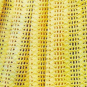 May include: A yellow crocheted blanket with a textured, open weave pattern.