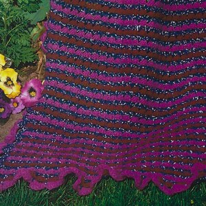 May include: A purple and brown striped crocheted blanket with a scalloped edge.