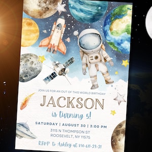 May include: An invitation with a watercolor illustration of space elements. It features an astronaut, planets, a rocket, and a satellite. The text reads "JACKSON is turning 5!" with event details. The invitation is designed for a birthday party.
