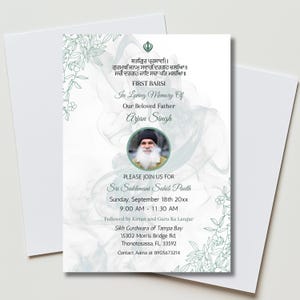 May include: A white invitation card with a floral design and text in English and Punjabi. The card includes a photo of a man and details for a memorial service, including the date, time, and location.