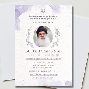 May include: A memorial card featuring a portrait of a man in a black turban and glasses, framed by a floral wreath. The card includes text in English and Punjabi, with the name 'GURUCHARAN SINGH' and dates. The background is white.