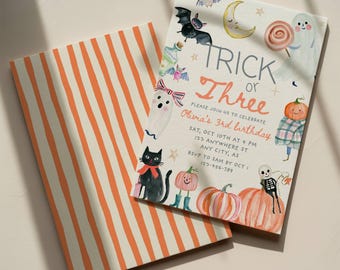 May include: A rectangular birthday invitation card featuring watercolor illustrations of ghosts, pumpkins, a black cat, and bats, with the text TRICK or Three, Olivia's 3rd birthday, and event details. Beside it lies a matching orange and white striped card.