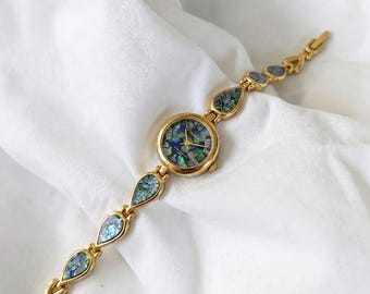 Handgefertigte Armbanduhr mit Opalstein, 18 Karat vergoldet